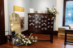 Vintage card catalogue display with a welcome sign at George Peabody Library, creating a timeless and elegant cocktial hour.